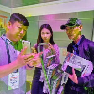 xingniu team presenting transformer solutions to visitors at an international power exhibition