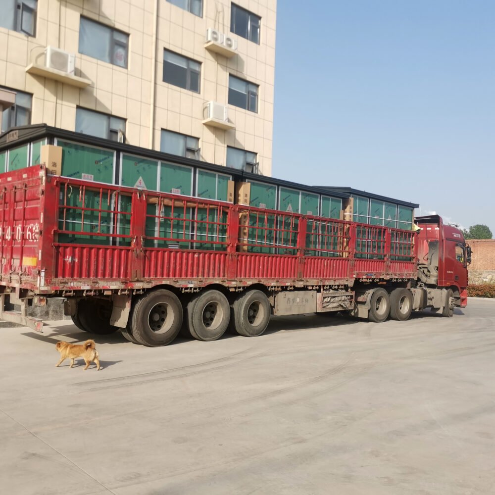 Truck carrying a transformer shipment outside the XNET factory