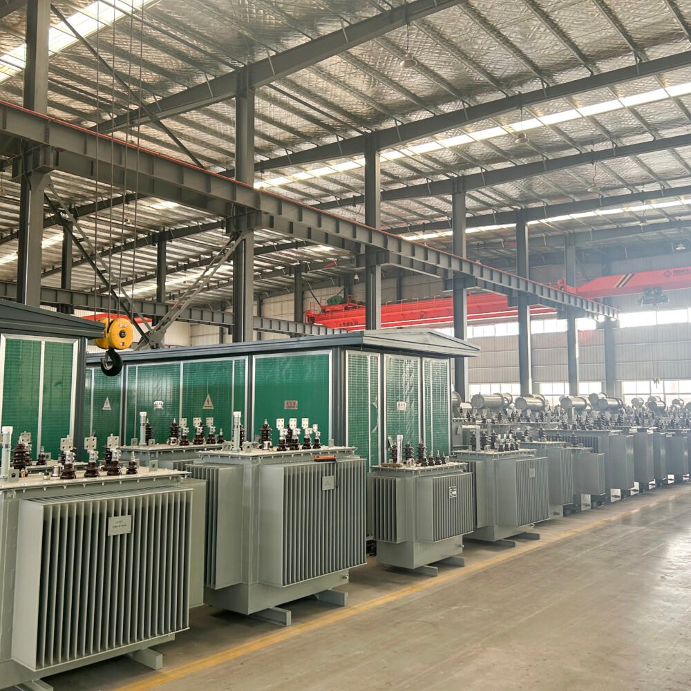 Completed transformers lined up in the workshop for inspection