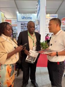 XNET representative presenting transformer solutions to visitors at a power industry exhibition
